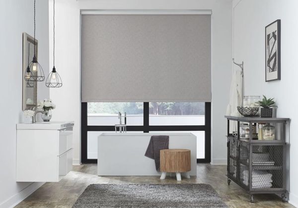 Lutron roller shades in a minimalist, contemporary room
