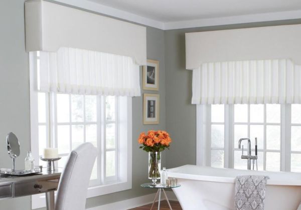 Lutron motorized drapery with pleated side panels