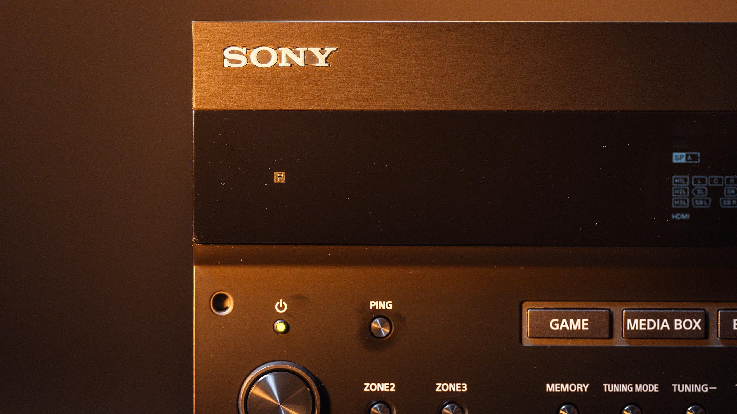 Close-up of Sony receiver buttons and branding